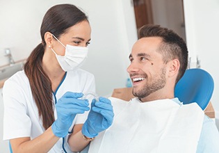 Patient and doctor discussing Invisalign in Ware. 