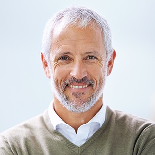 Senior man with natural looking denture