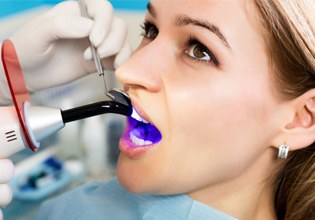 a patient receiving tooth-colored fillings in Ware