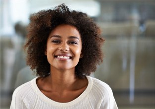 : a woman smiling with tooth-colored fillings in Ware