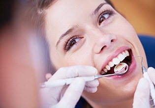 Woman receiving dental checkup