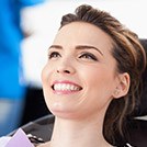 Smiling woman in dental chair