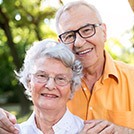 Smiling senior couple outdoors