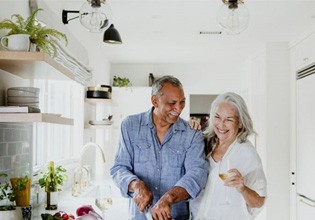 Senior couple preparing nutritious meal together